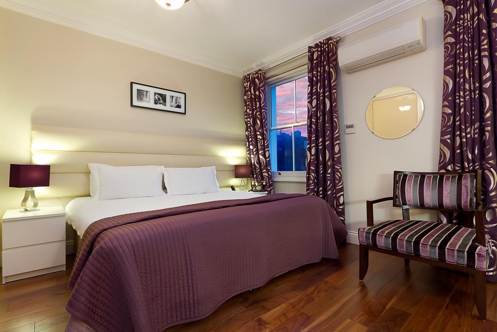 Апартаменты Kensington One Лондон Экстерьер фото